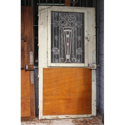 1347 - Pair of antique French Art Deco period entry doors, with wrought iron panels, circa 1920's  each app... 