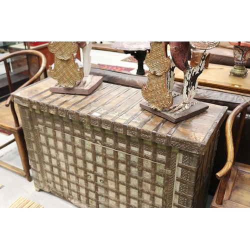 1172 - Indian wooden cupboard with metal banding, approx 86cm H x 151cm W x 48cm D