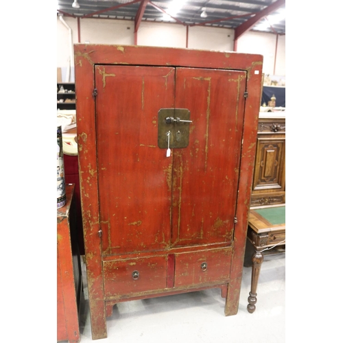 1182 - Oriental red lacquer wedding cupboard, with two drawers, approx 182cm H x 105cm W x 48cm D