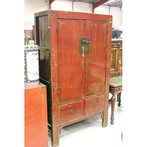 1182 - Oriental red lacquer wedding cupboard, with two drawers, approx 182cm H x 105cm W x 48cm D