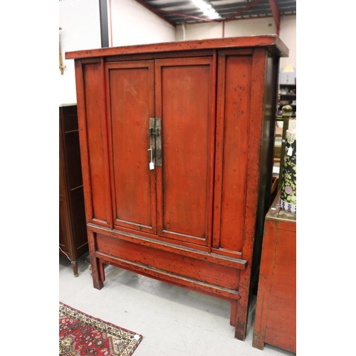 1187 - Oriental red lacquer wedding cupboard, approx 183cm H x 136cm W x 60cm D