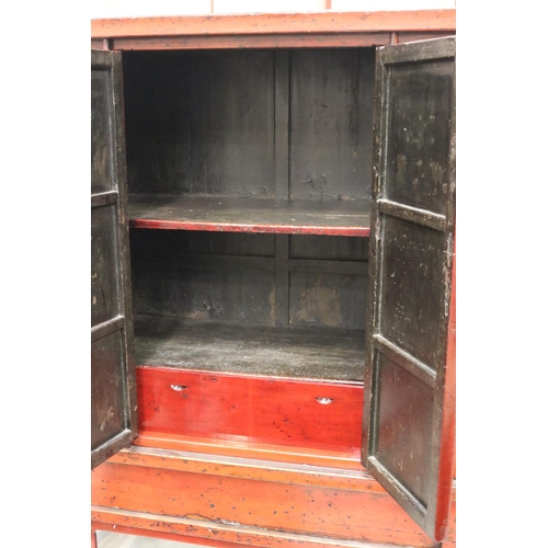 1187 - Oriental red lacquer wedding cupboard, approx 183cm H x 136cm W x 60cm D