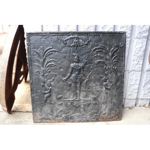 1357 - Antique French cast iron fireback, showing a archer to centre, approx 53cm Sq