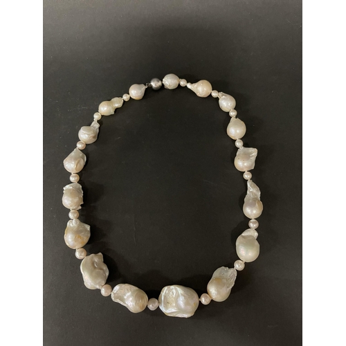 200 - Baroque fresh water pearl necklace with 14ct white gold clasp