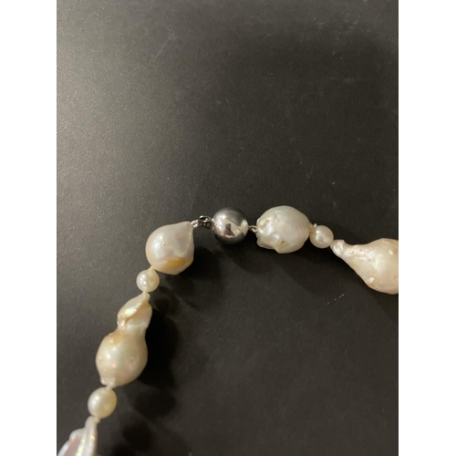 200 - Baroque fresh water pearl necklace with 14ct white gold clasp