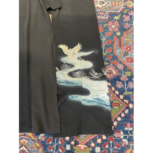 205 - Fine Japanese Kimono with black ground with embroided storks, (no measurements for this lot)