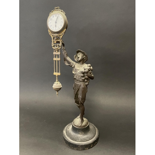 212 - Antique Onion Boy seller mystery swing clock, approx 40 cm high
