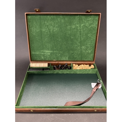 219 - Mulberry of London leather cased chess set with fitted interior, approx 37.5 cm high x 25.5 cm wide