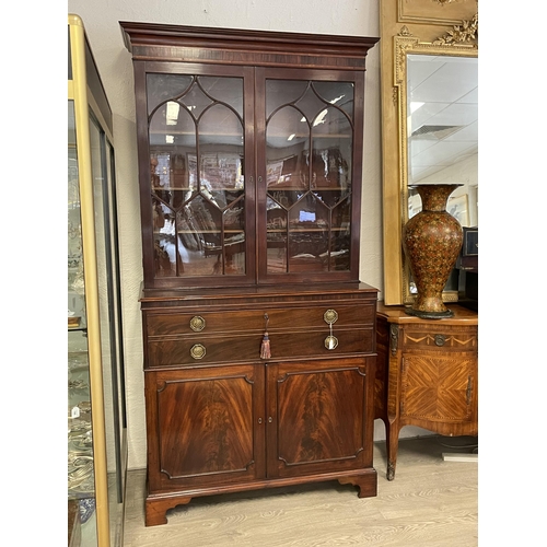 230 - A antique George III mahogany secretaire bookcase, the moulded cornice above a pair of astragal glaz... 