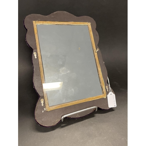 256 - Decorative pierced silvered metal mounted framed mirror, approx 33 cm x 24 cm