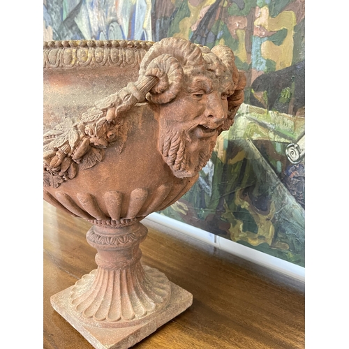 5 - Terracotta garden urn, cast in high relief with mask heads and swags of flowers, approx 49 cm high x... 