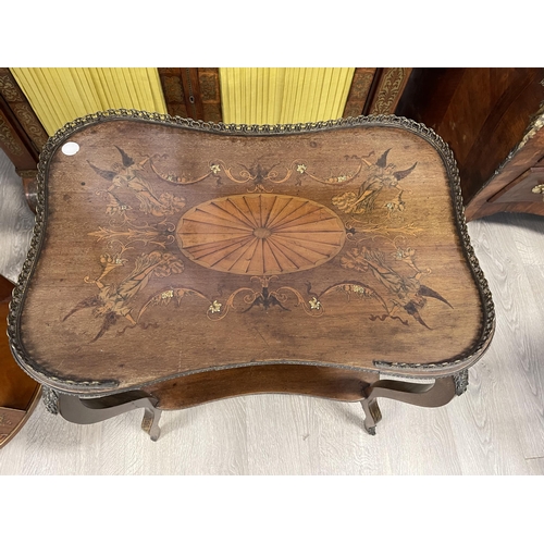 9 - Antique inlaid shaped top two tiered tea table, with pierced brass gallery and brass mounts, approx ... 