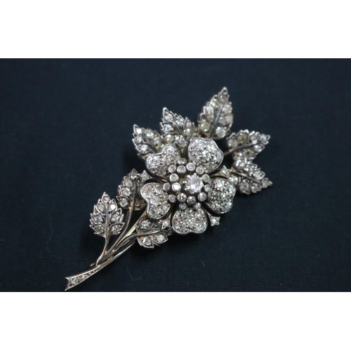 1118 - Impressive floral motif brooch, sterling silver over 9 carat yellow gold back, hand made, claw set w... 