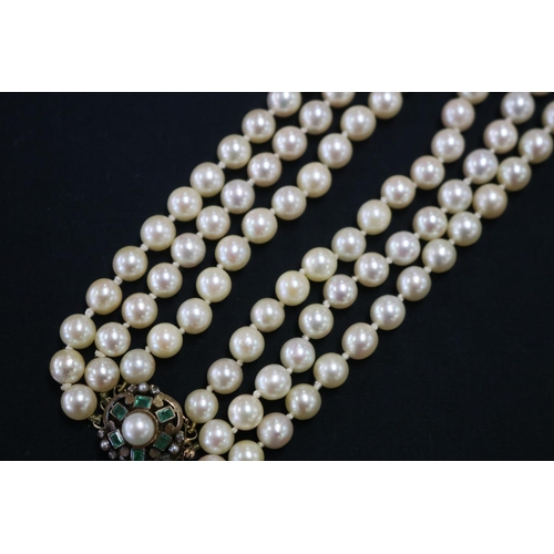 1121 - Triple row necklace of forty five, forty seven, and fifty one cultured pearls (one hundred and forty... 