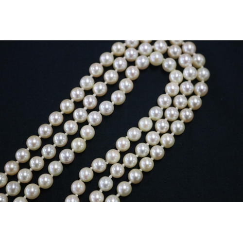 1121 - Triple row necklace of forty five, forty seven, and fifty one cultured pearls (one hundred and forty... 