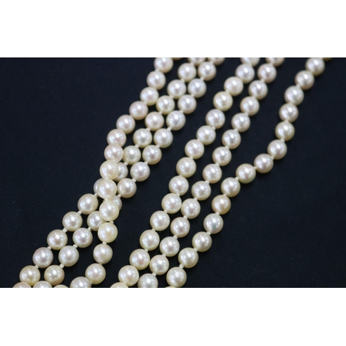 1121 - Triple row necklace of forty five, forty seven, and fifty one cultured pearls (one hundred and forty... 