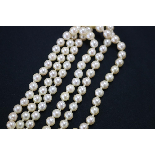 1121 - Triple row necklace of forty five, forty seven, and fifty one cultured pearls (one hundred and forty... 