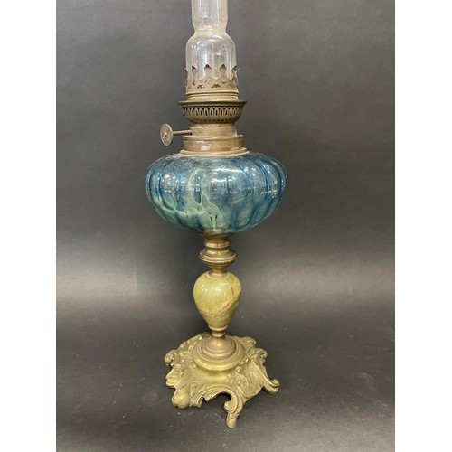 88 - Antique French oil lamp, cast brass C scroll base, blue glass bowl, approx 56 cm high