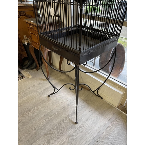 379 - Large dome topped square metal bird cage and stand, approx 176 cm high x 54 cm square