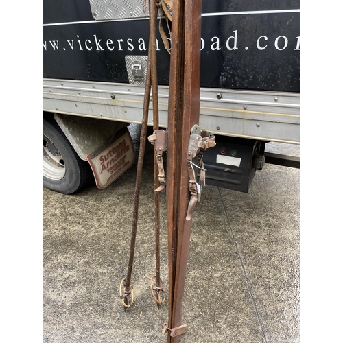 382 - Set of antique skiis and poles by Shuck, approx 188cm L