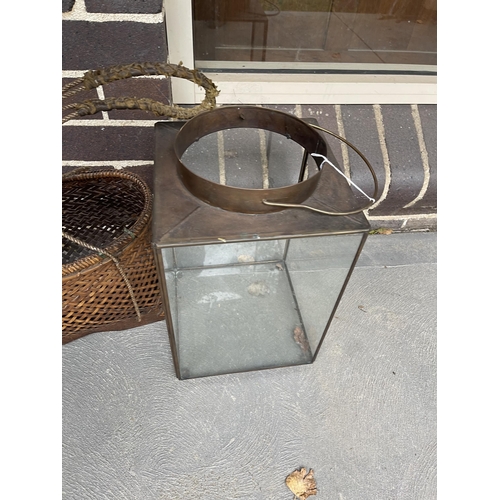 400 - Large square copper and glass storm light with carry handle, along with a native hand made carry bas... 