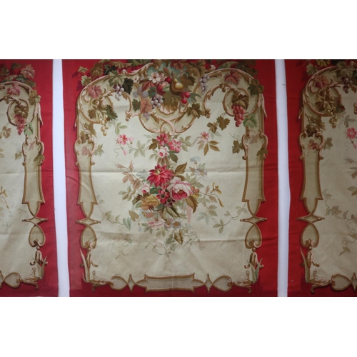 1204 - Set of four French late 19th century Aubusson tapestry wall hangings, all of red ground with floral ... 