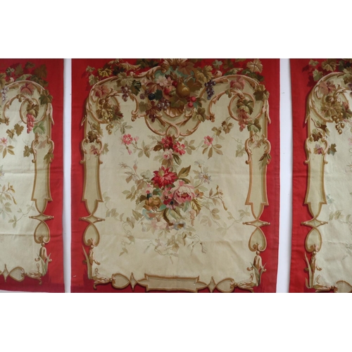 1204 - Set of four French late 19th century Aubusson tapestry wall hangings, all of red ground with floral ... 