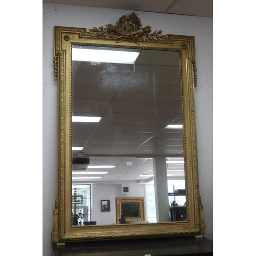 1249 - Fine antique 19th century French gilt surround salon mirror, elaborate crest with crossed torch and ... 