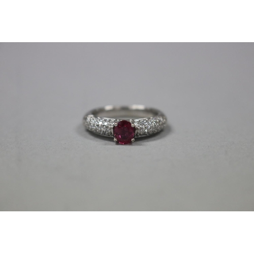 1248 - RETURNED 13/7/24 - Pave diamond and ruby dress ring set in 18ct white gold, Size K, as per valuation... 