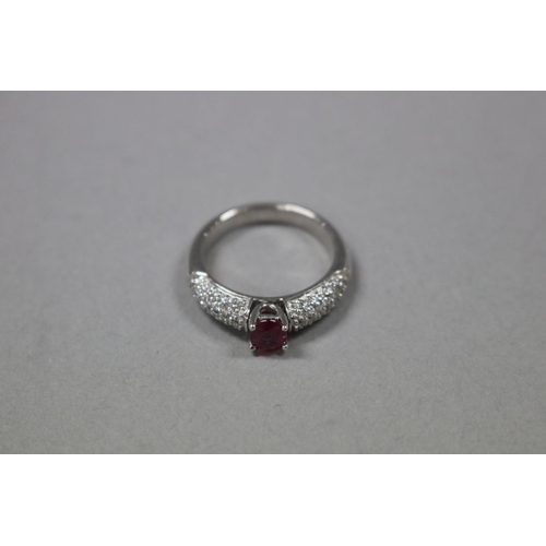 1248 - RETURNED 13/7/24 - Pave diamond and ruby dress ring set in 18ct white gold, Size K, as per valuation... 