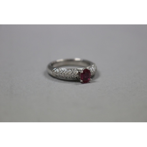 1248 - RETURNED 13/7/24 - Pave diamond and ruby dress ring set in 18ct white gold, Size K, as per valuation... 