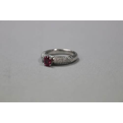 1248 - RETURNED 13/7/24 - Pave diamond and ruby dress ring set in 18ct white gold, Size K, as per valuation... 