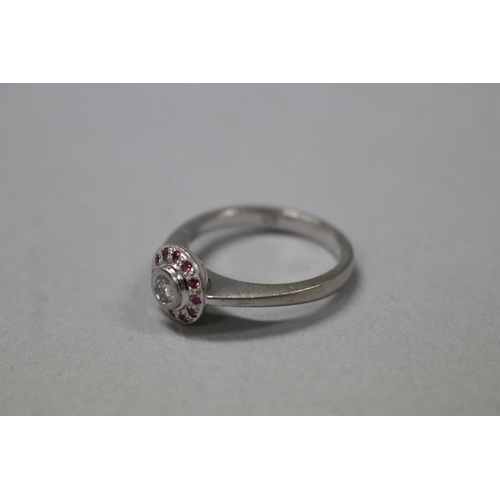 1251 - RETURNED 13/7/24 - Pink sapphire and diamond ring set in white 18ct gold, size Q-R, with valuation, ... 