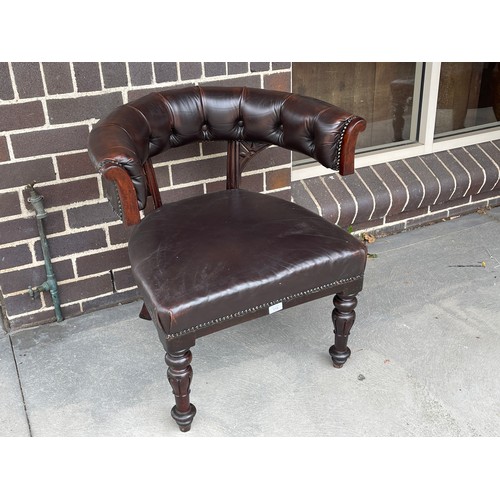 118 - Antique English mahogany William IV horse shoe shaped desk chair, with dark brown leather upholstery... 