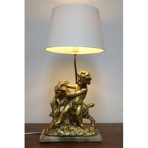 1135 - Figural gilt putto with goat lamp on marble base, with shade, working at time of inspection, approx ... 