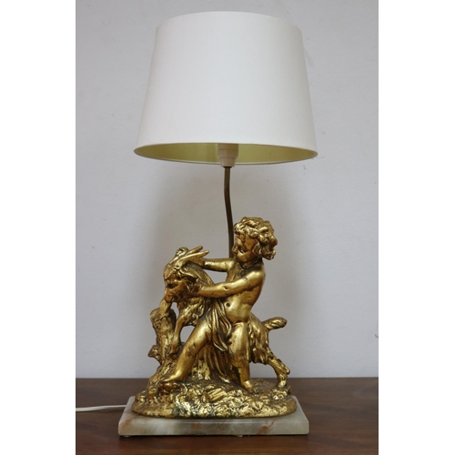 1135 - Figural gilt putto with goat lamp on marble base, with shade, working at time of inspection, approx ... 
