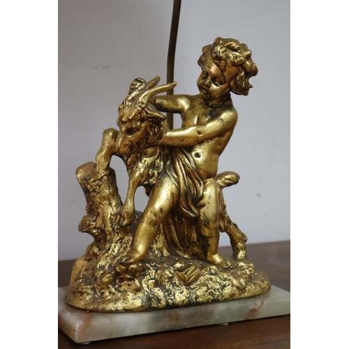 1135 - Figural gilt putto with goat lamp on marble base, with shade, working at time of inspection, approx ... 