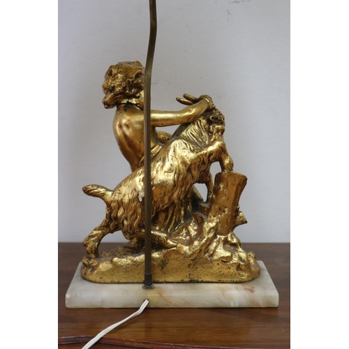 1135 - Figural gilt putto with goat lamp on marble base, with shade, working at time of inspection, approx ... 