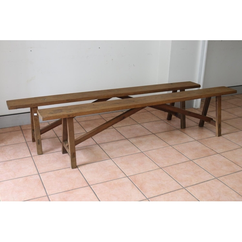 1208 - Pair of French wooden benches with trestle ends, approx 202cm L x 20cm W x 46cm H (2)