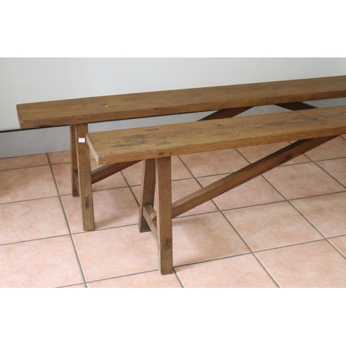 1208 - Pair of French wooden benches with trestle ends, approx 202cm L x 20cm W x 46cm H (2)