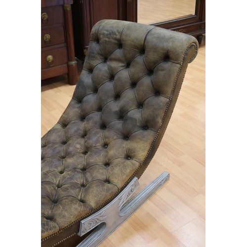 1001 - Rare & unique aluminum based leather Art Deco chaise lounge of S form, the base cast with floral mot... 