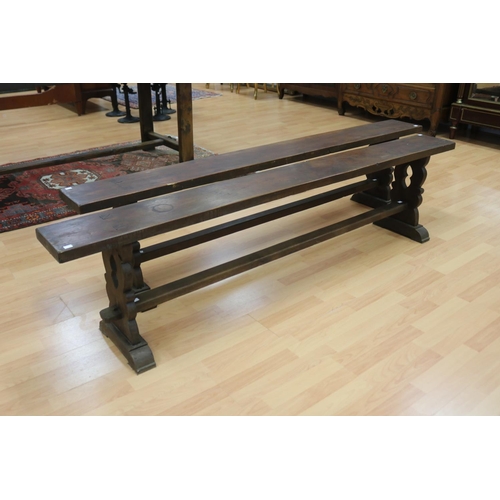 1106 - Pair of French benches with trestle ends & central stretcher to each, approx 199cm L x 21.5cm W x 47... 