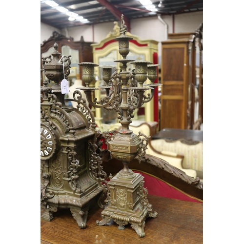 1302 - Antique French bronze mantle clock and garnitures, in the Renaissance revival style, no key, has pen... 