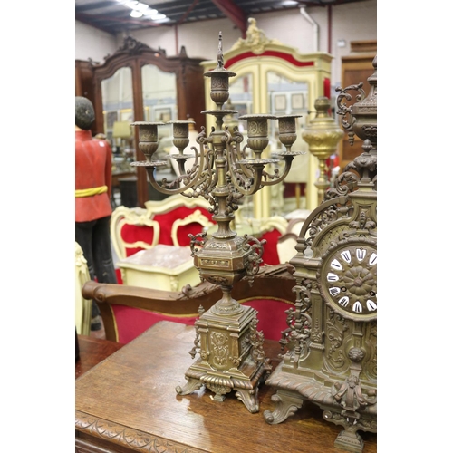 1302 - Antique French bronze mantle clock and garnitures, in the Renaissance revival style, no key, has pen... 