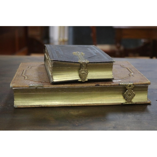 1292 - Two antique French photo albums, to include some photos, approx 28cm x 21cm and smaller (2)