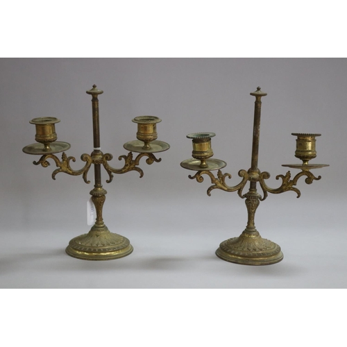 1113 - Pair of French brass two light candlesticks, standing on heavy cast base, approx 25cm H x 21cm W (2)