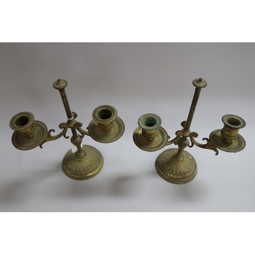 1113 - Pair of French brass two light candlesticks, standing on heavy cast base, approx 25cm H x 21cm W (2)