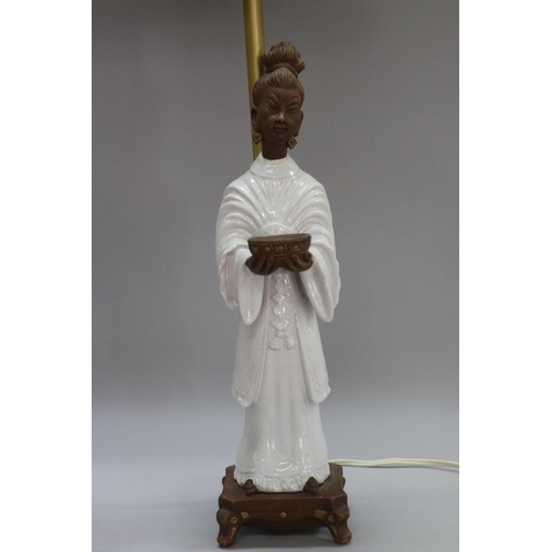 1136 - Vintage Italian white ceramic table lamp of a Chinese lady holding a bowl, with shade, unknown worki... 