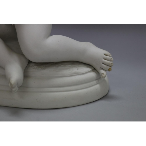 1170 - F. KESSLER (1792-1882) bisque porcelain figure of a putto holding torch, against a pedestal, signed ... 