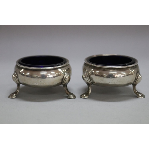 1178 - Pair of antique 18th century hallmarked sterling silver salts with blue glass liner, London, total a... 